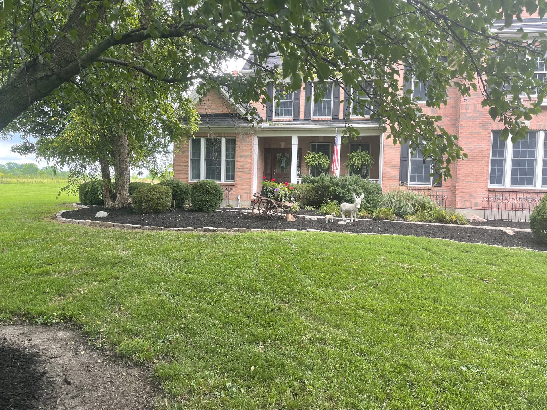 Mulch Installation and Bed Cleanup at a Liberty Township Property image