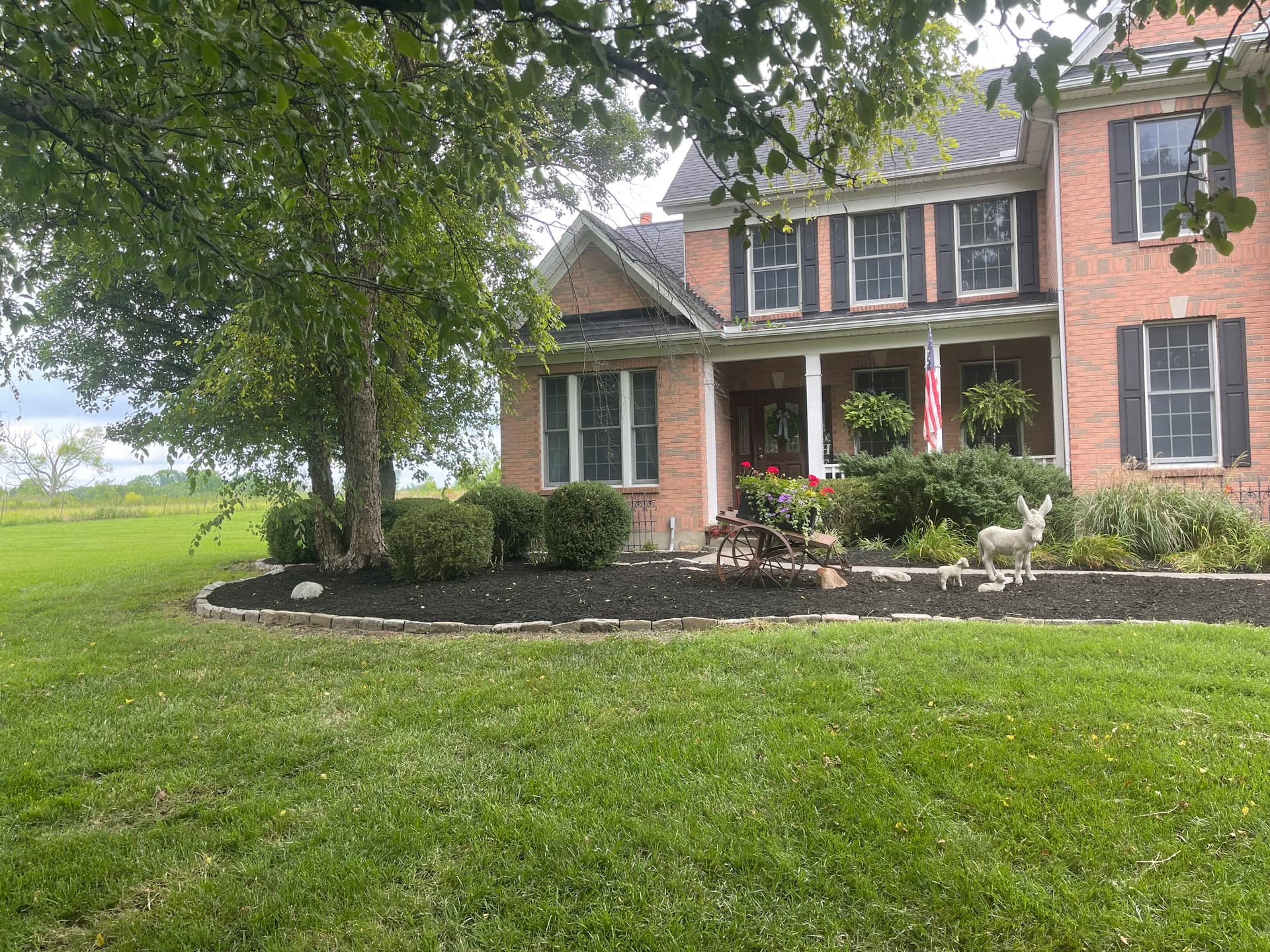 Gallery photos for Mulch Installation and Bed Cleanup at a Liberty Township Property: Image #2
